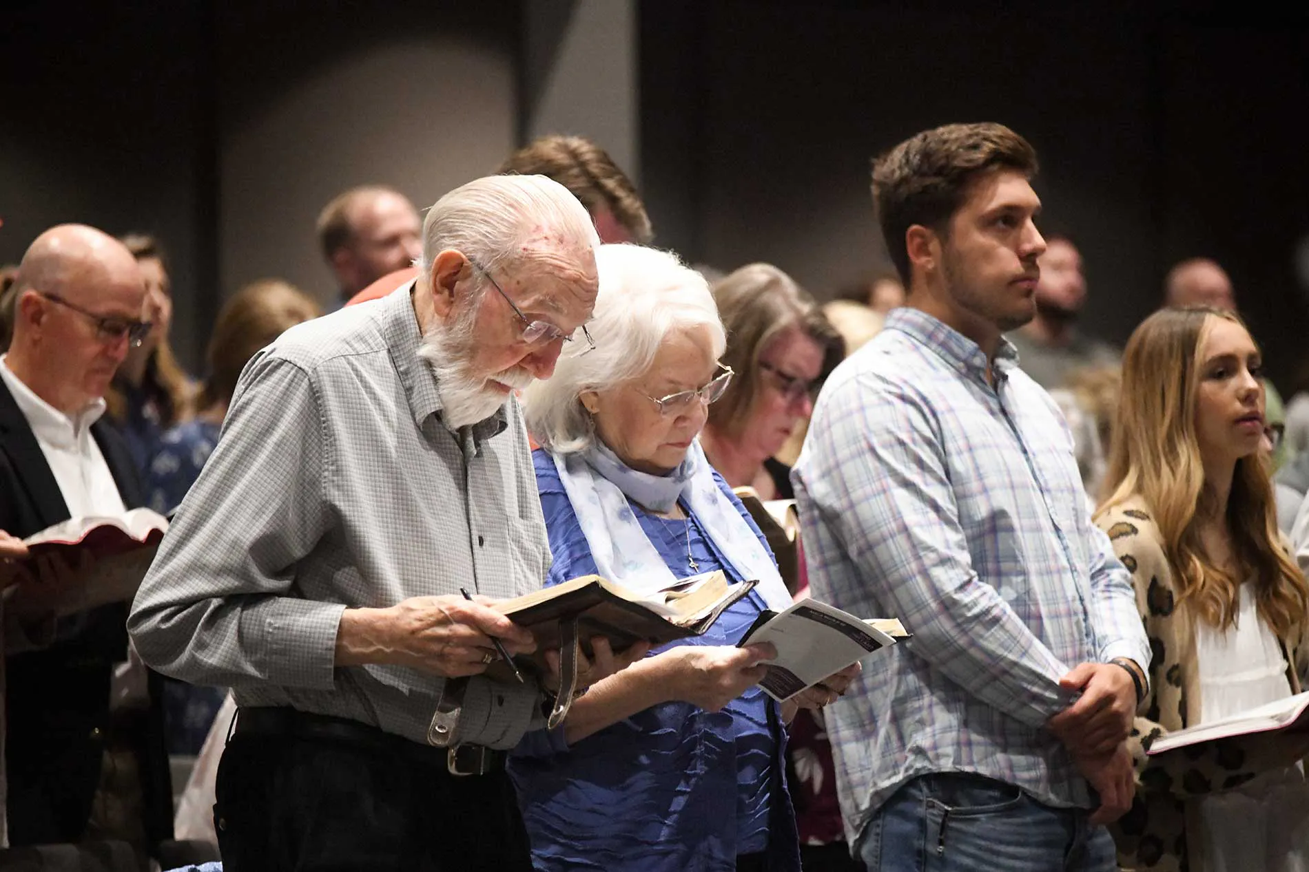 People worshipping in church