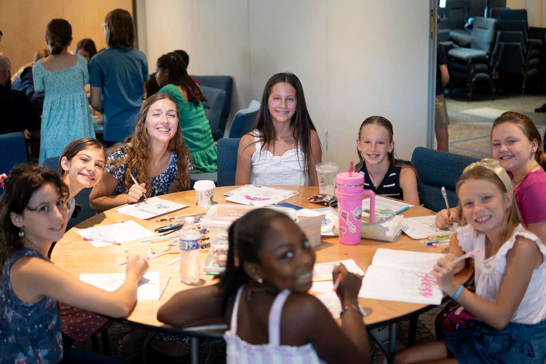 Adolescent-Years Teens sitting at a table