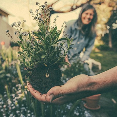 Local Witness Teams - Web - Activity Thumbnail 03 Woman planting flowers