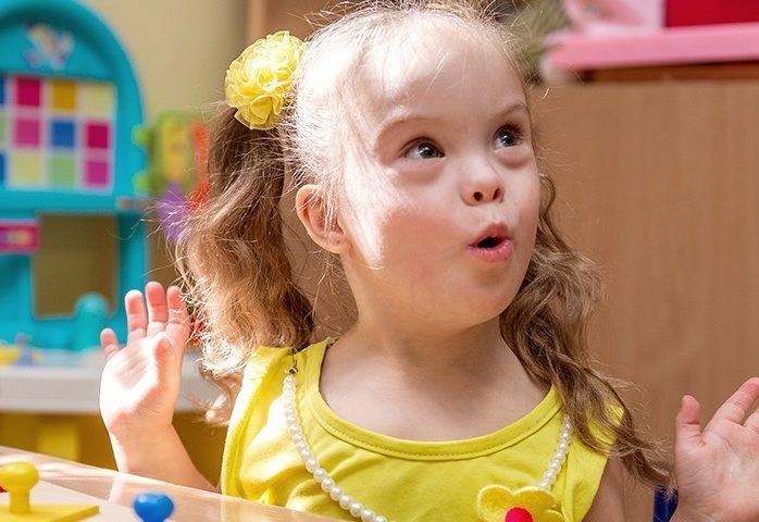 Special Needs - Web - Hero Image - 02 Special needs girl playing